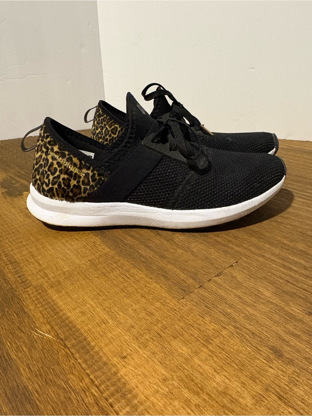 New Balance Black Knit Sneakers with Leopard Heel Detail